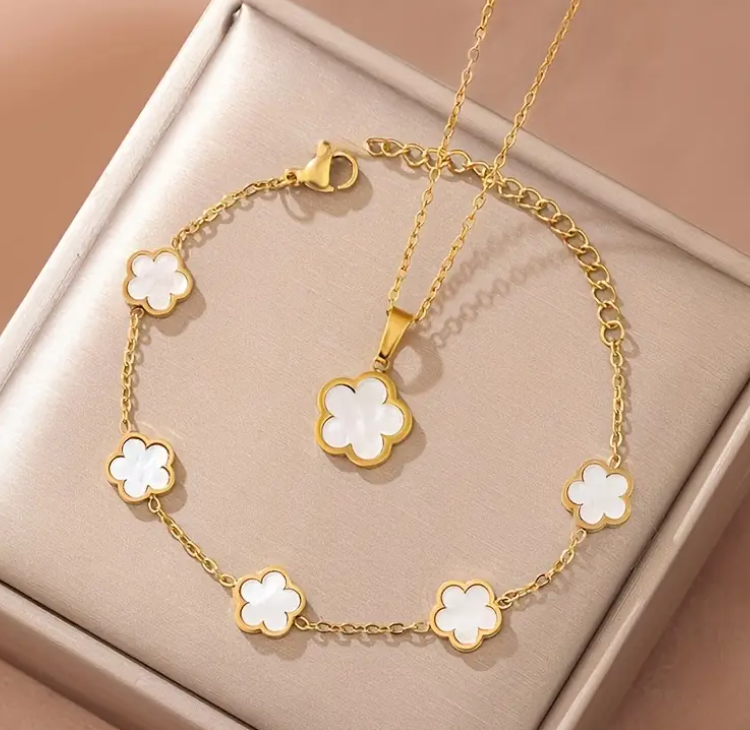 A Stylish And Elegant Jewelry Set for Women, Featuring a Two-Piece Floral Necklace And Bracelet.